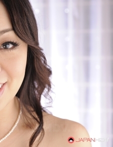 Yuna Yamami plays with big boobs and spreads