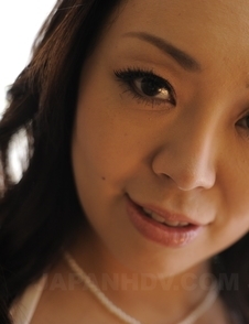 Yuna Yamami plays with big boobs and spreads