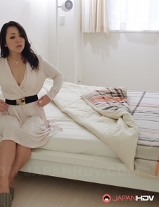 Hot Yuna Yamami in white lingerie sucks cock