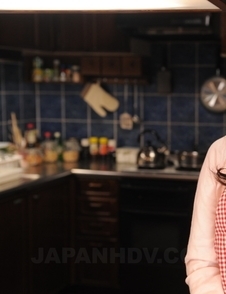 This Asian housewife Nozomi Hazuki poses in
