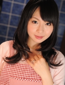 This Asian housewife Nozomi Hazuki poses in
