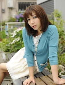 Juri Kitahara in blue sweater and lace skirt