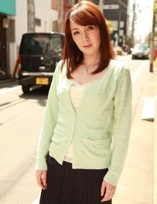 Chika Sasaki in green sweater and short skirt