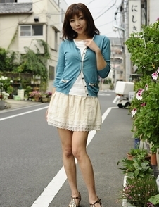 Juri Kitahara in blue sweater and lace skirt
