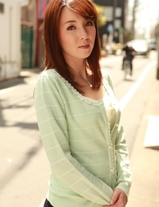 Chika Sasaki in green sweater and short skirt