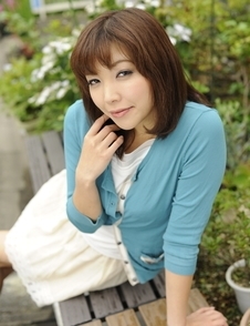 Juri Kitahara in blue sweater and lace skirt