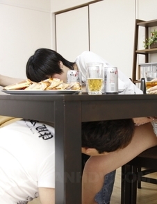 Hot Hitomi Okubo has pussy rubbed under table