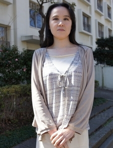 Junko Nishimura is an Asian lady presenting