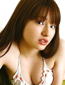 Saori Shiina in sexy lingerie jumps and plays in her bed