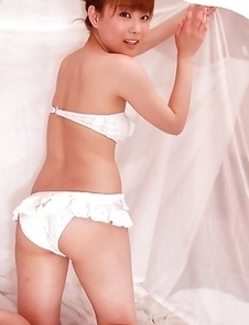 Satomi Shigemori in white lingerie plays with bride veil