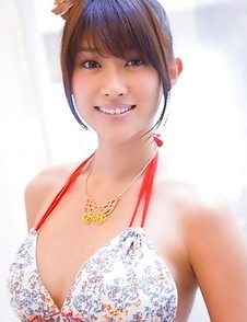 Mikie Hara with big tits and sexy legs listens to the music