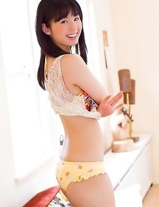 Rina Koike in colorful lingerie loves her dog pillows