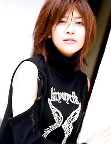 Miho Shiraishi exposes big tits and naughty attitude at cam