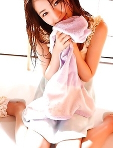 Rei Okamoto in sexy lingerie plays making soap bubbles