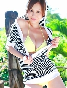 Anri Sugihara shows big melons while playing in water