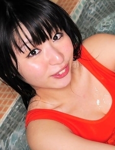 Megumi Suzumoto with big boobs in orange bath suit loves sports