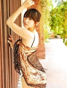 Shou Nishino is playful at the pool and exposes sexy legs