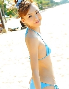 Aino Kishi in blue bath suit is a true beauty enjoying sand