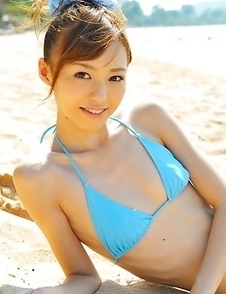 Aino Kishi in blue bath suit is a true beauty enjoying sand