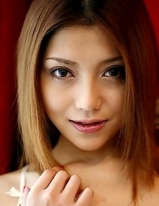 Sexy Aki Anzai in fishnet lingerie