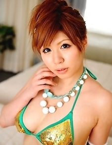 Cute Japanese babe poses outdoor