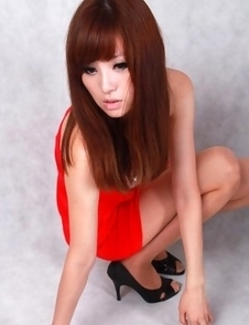 Sandy on heels shows hot behind in red dress for pictures