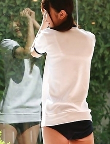 Noriko Kijima in sports equipment is playful in the house