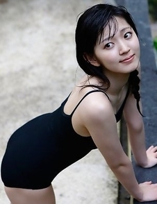 Airi Suzuki walks on favorite streets exposing her curves