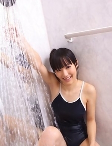 Yuri Hamada washes and showers her hot body over bath suit