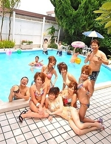 Asian girls pose in bikinis outside