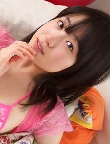 Hijiri Sachi has sexy tummy and juicy jugs in pink lingerie
