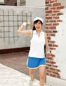 Kana Yuuki shows flexibility while playing with tennis ball