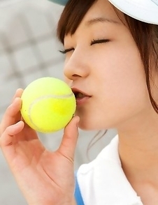 Kana Yuuki shows flexibility while playing with tennis ball