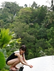 Airi Suzuki in bath suit enjoys petals all over her body