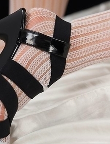 Stunning young girl Ayano Hidaka showing her feet in a white pantyhose