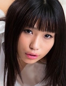 Brunette with bangs Luna Kobayashi shows her delicious pussy on a white bed