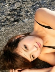 Rina Nagasaki in see through lingerie shows legs on rocks