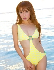 Nozomi Kawasaki in yellow bath suit enjoys the sun and sea