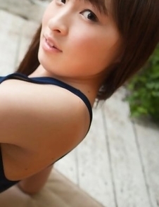 Maho Kiruma shows sexy curves in bath suit in her garden