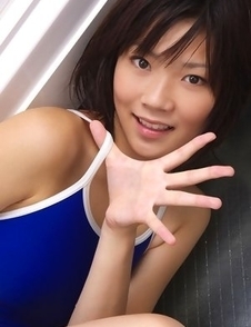 Airi Sakuragi puts soap and shower on body over bath suit