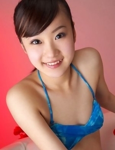 Kana Yuuki in fishnets has fine curves in blue bath suit